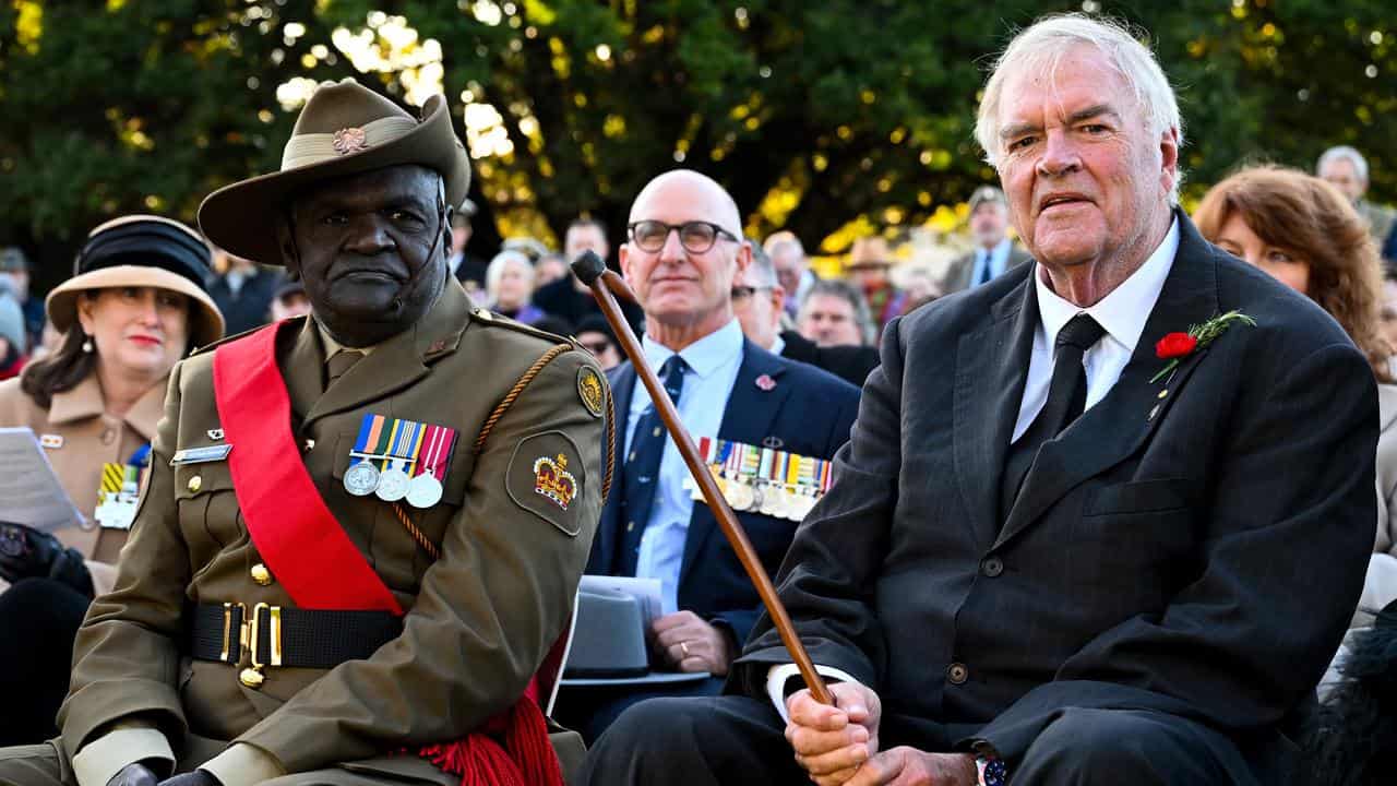 Kim Beazley (right) and Warrant Officer Tommy Munyarryan (file image)