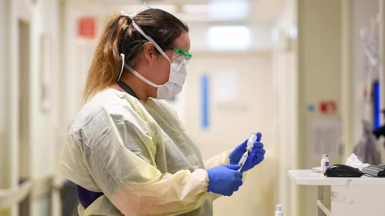 A healthcare working at a hospital.