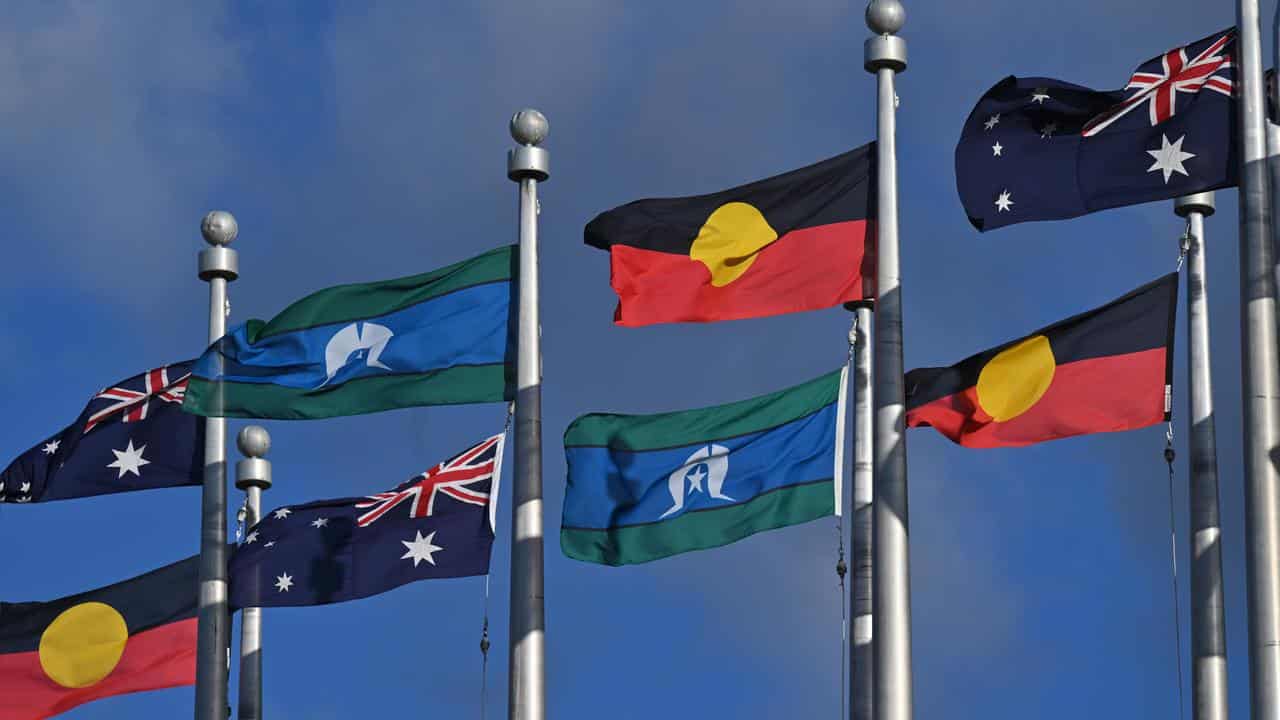 Flags flying outside Parliament House (file image)