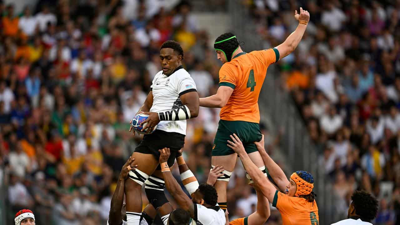 Nick Frost (4) contests a Rugby World Cup lineout against Fiji.  