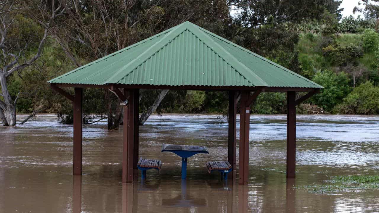 A gazebo in flood waters