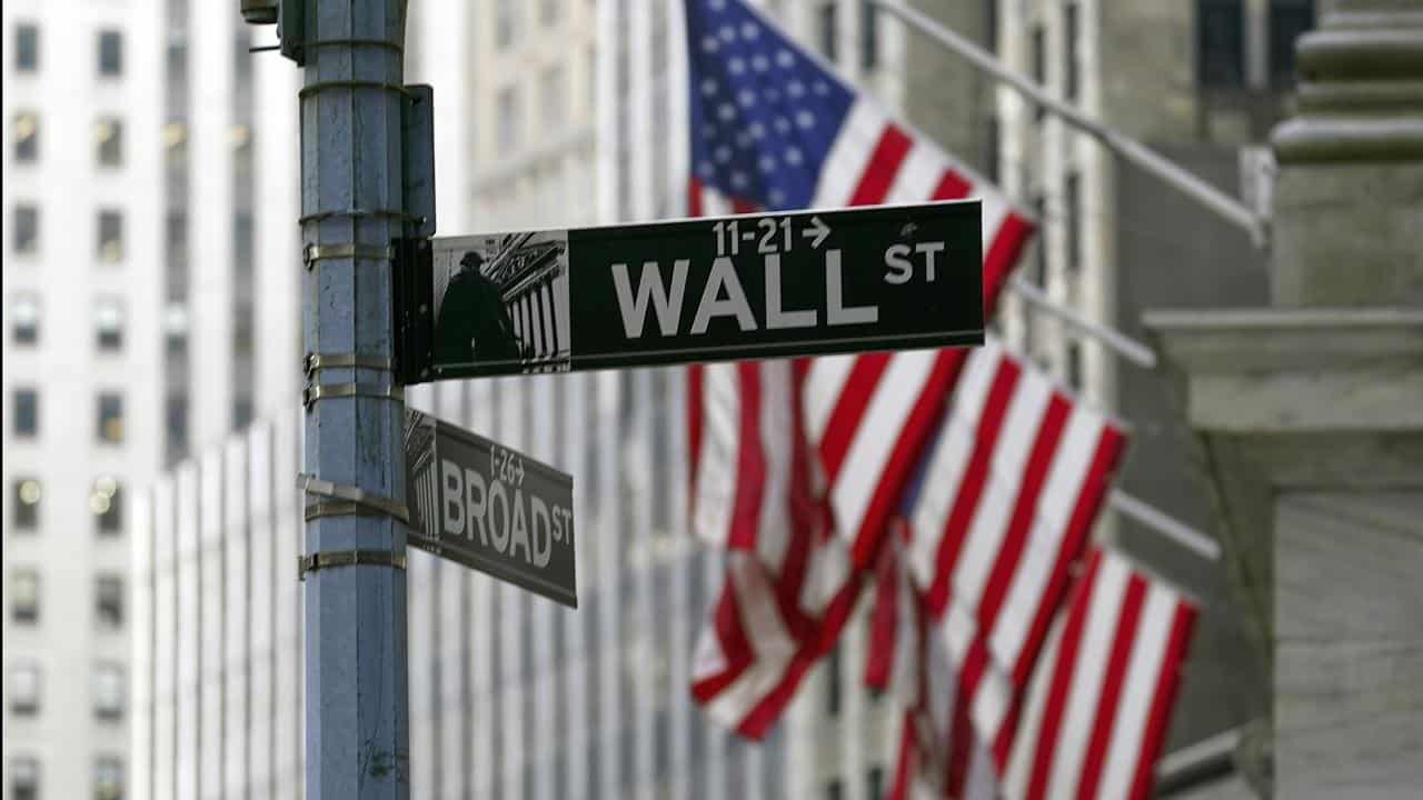 Wall St sign outside New York Stock Exchange