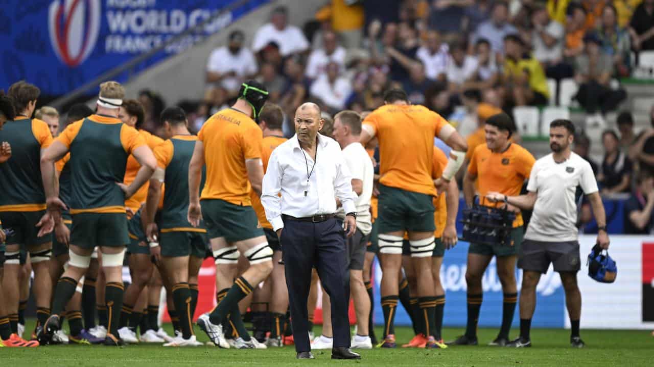 Eddie Jones and the Wallabies after losing to Fiji at Rugby World Cup.