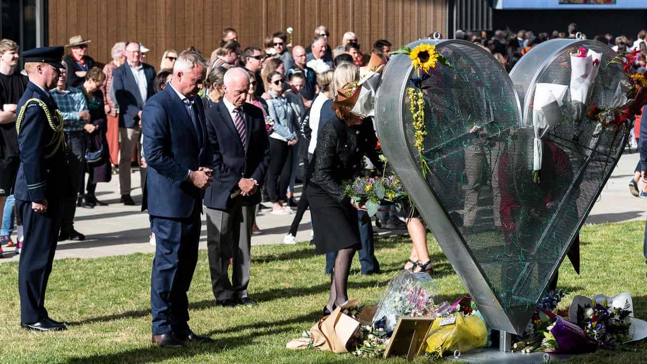 Premier Jeremy Rockliff pays his respects at the anniversary ceremony