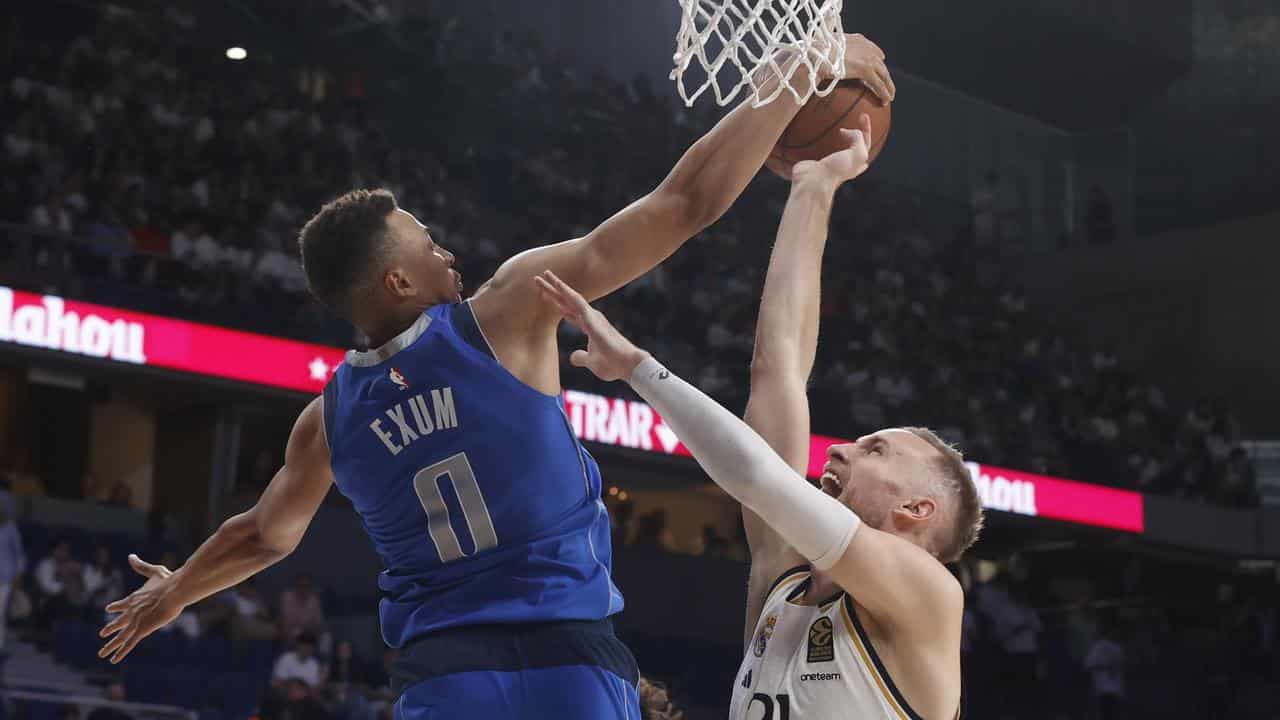 Dante Exum and Dzanan Musa.