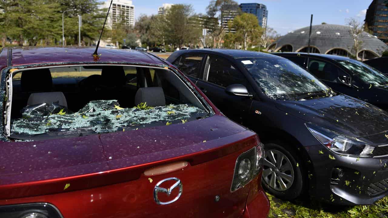 Cars damaged by hail.