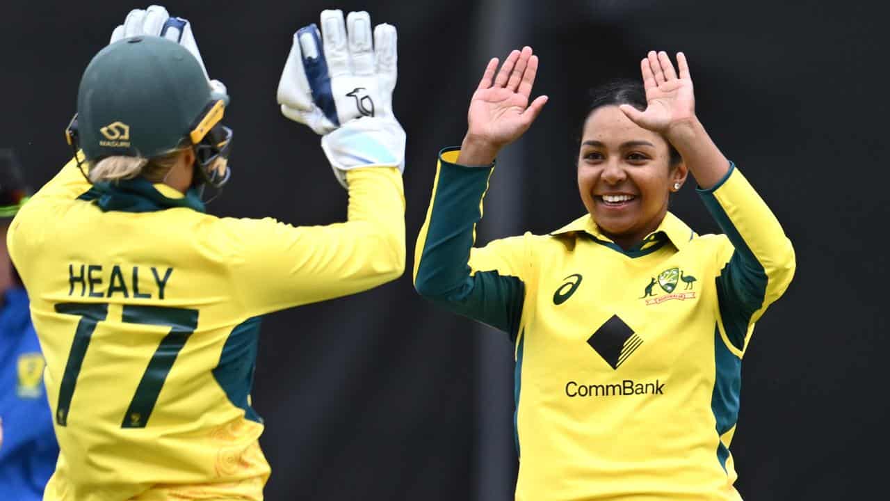 Australia captain Alyssa Healy (left) congratulates Alana King