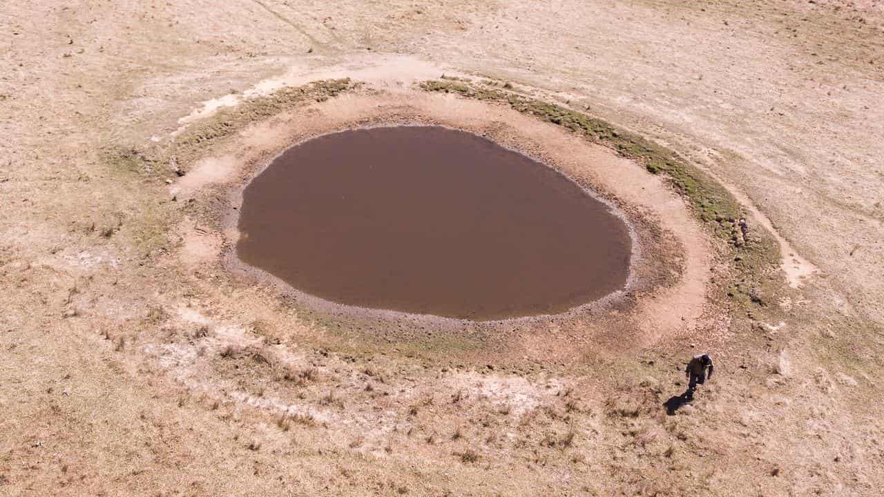 James Clarke's dams are drying up on his sheep and cattle property.