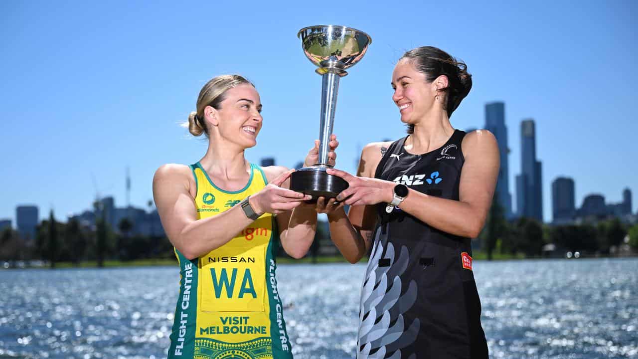 Diamonds and Silver Ferns captains with the Constellation Cup. 