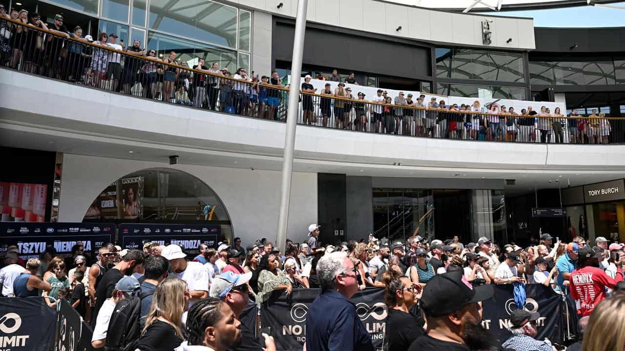 Fans watch Tszyu weigh-in.