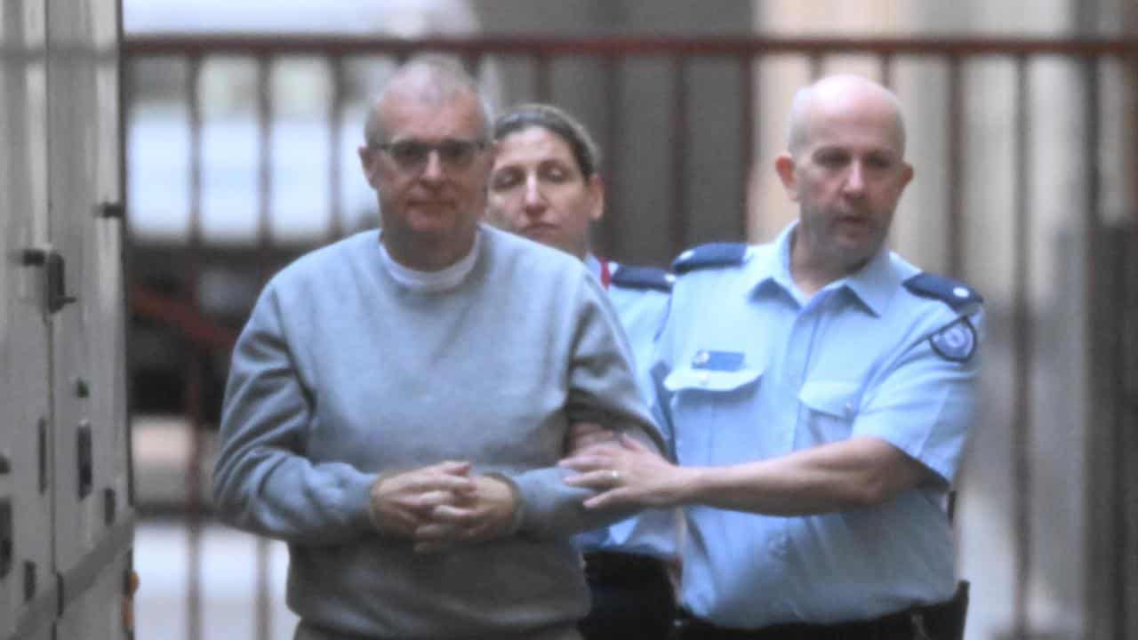 Peter John Wetzler (left) arrives at the Supreme Court of Victoria