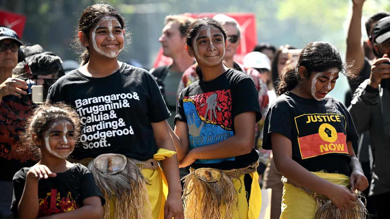 Indigenous dancers at a protest against Santos' Narrabri gas project.