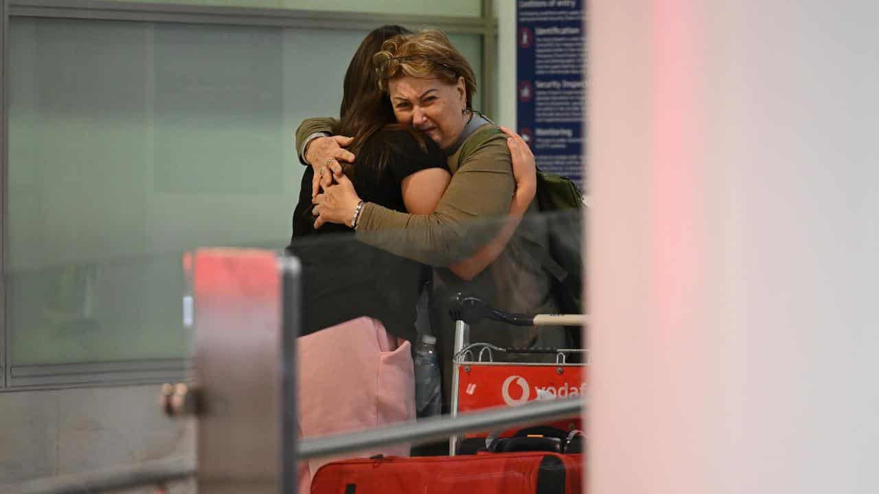 Australians arrive home from Israel