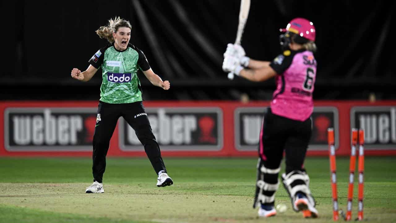 Annabel Sutherland (left) celebrates the wicket of Ashleigh Gardner