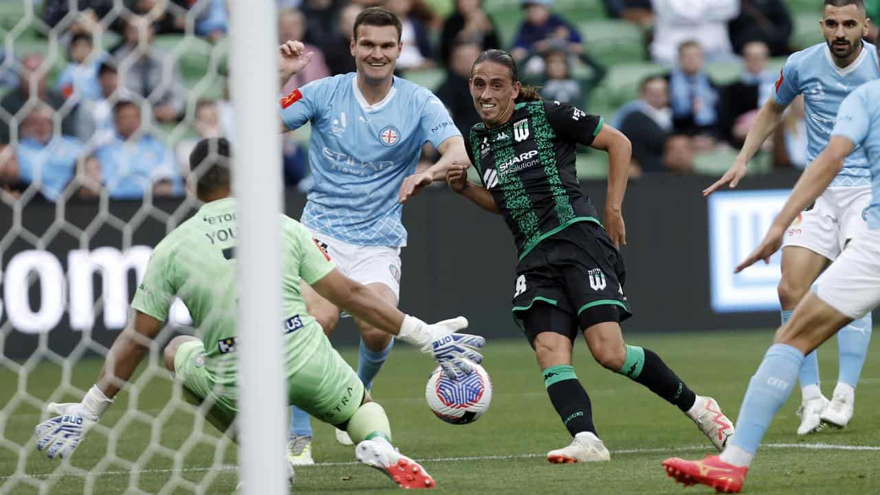 Lachie Wales (8) scores for Western United against Melbourne City.