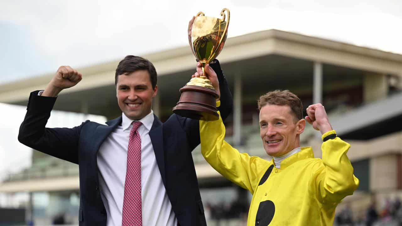 Trainer Sam Freedman (l) and jockey Mark Zahra with the Caulfield Cup.