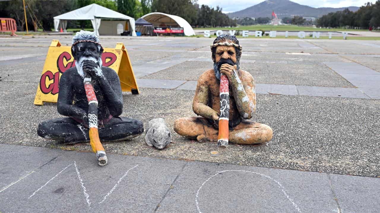 NO” is chalked at the Aboriginal Tent Embassy in Canberra