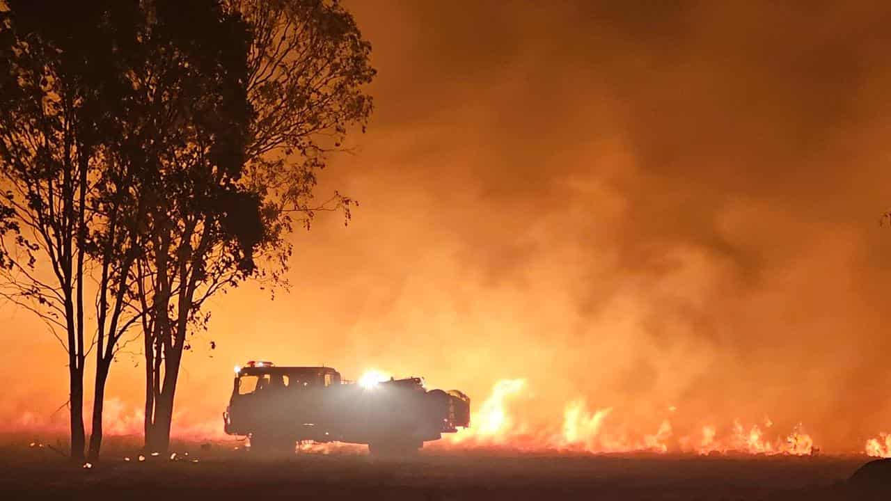 QFES ground crews responding to a fire in Millmerran, Queensland