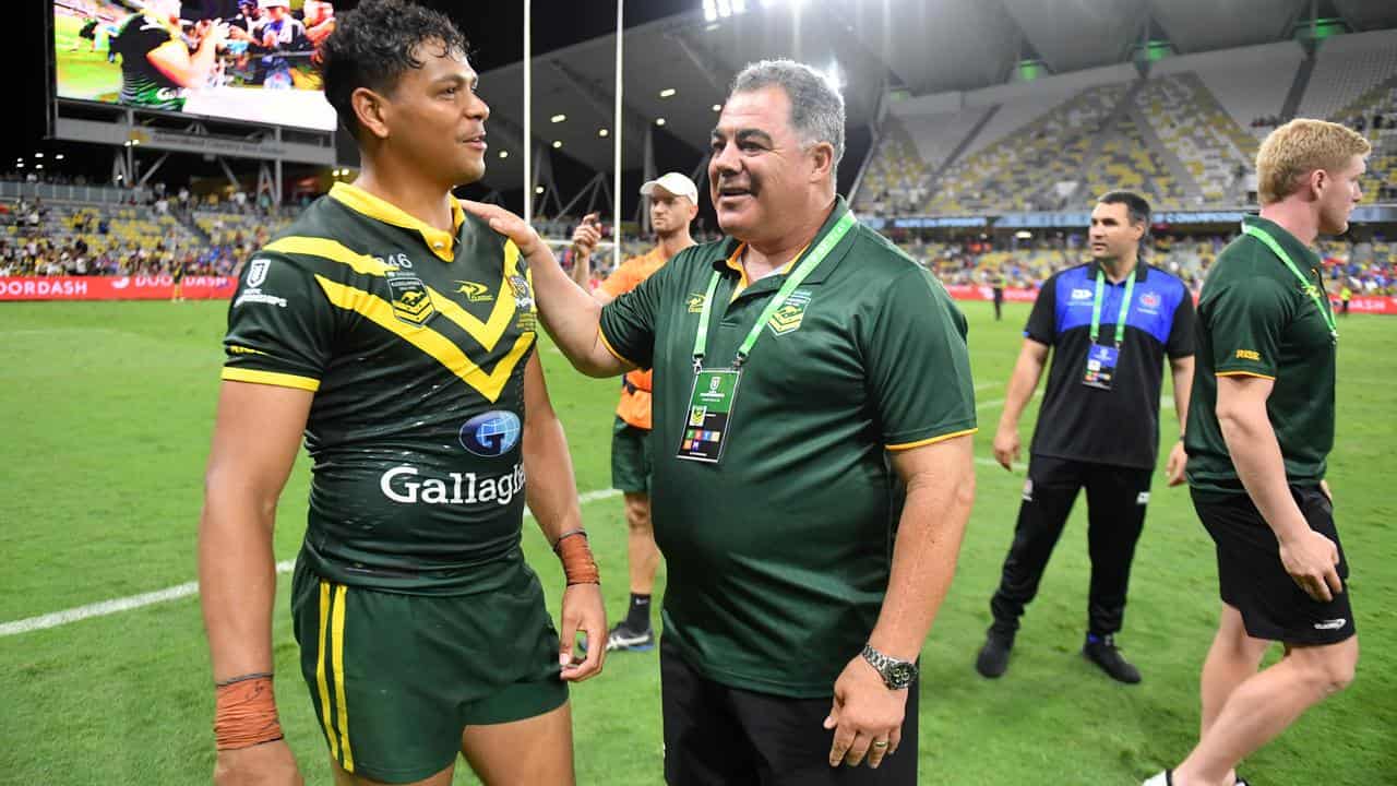 Mal Meninga (centre) chats with Selwyn Cobbo