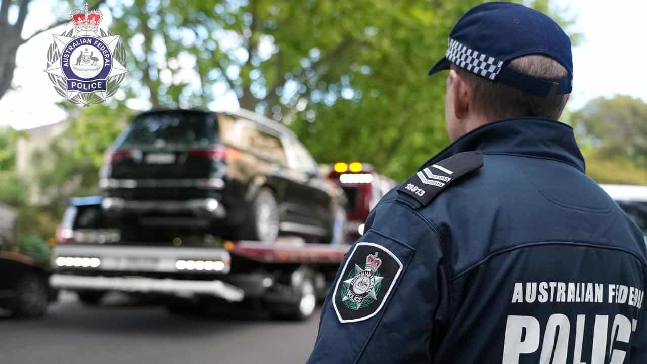 A luxury car being seized by AFP officers. 