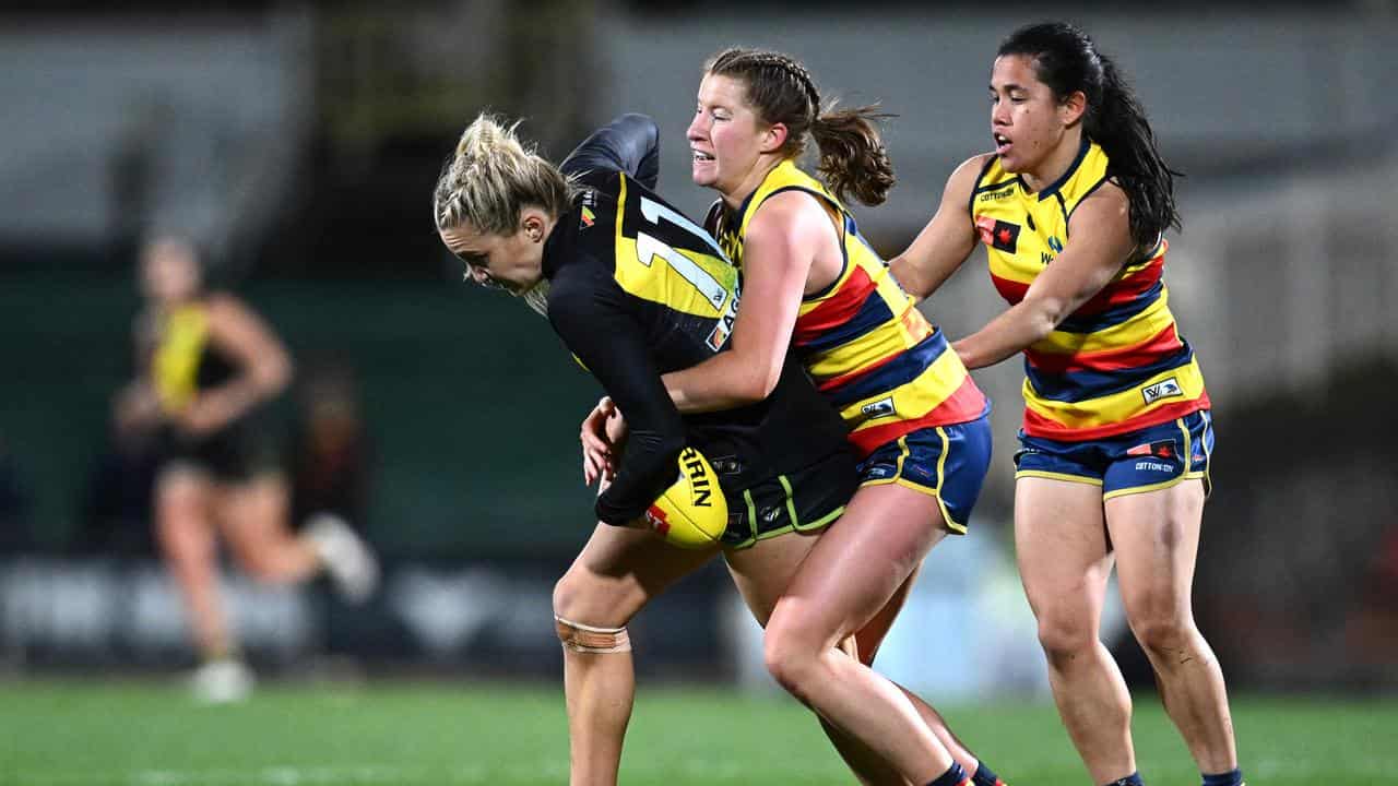 Adelaide's Sarah Goodwin (centre)