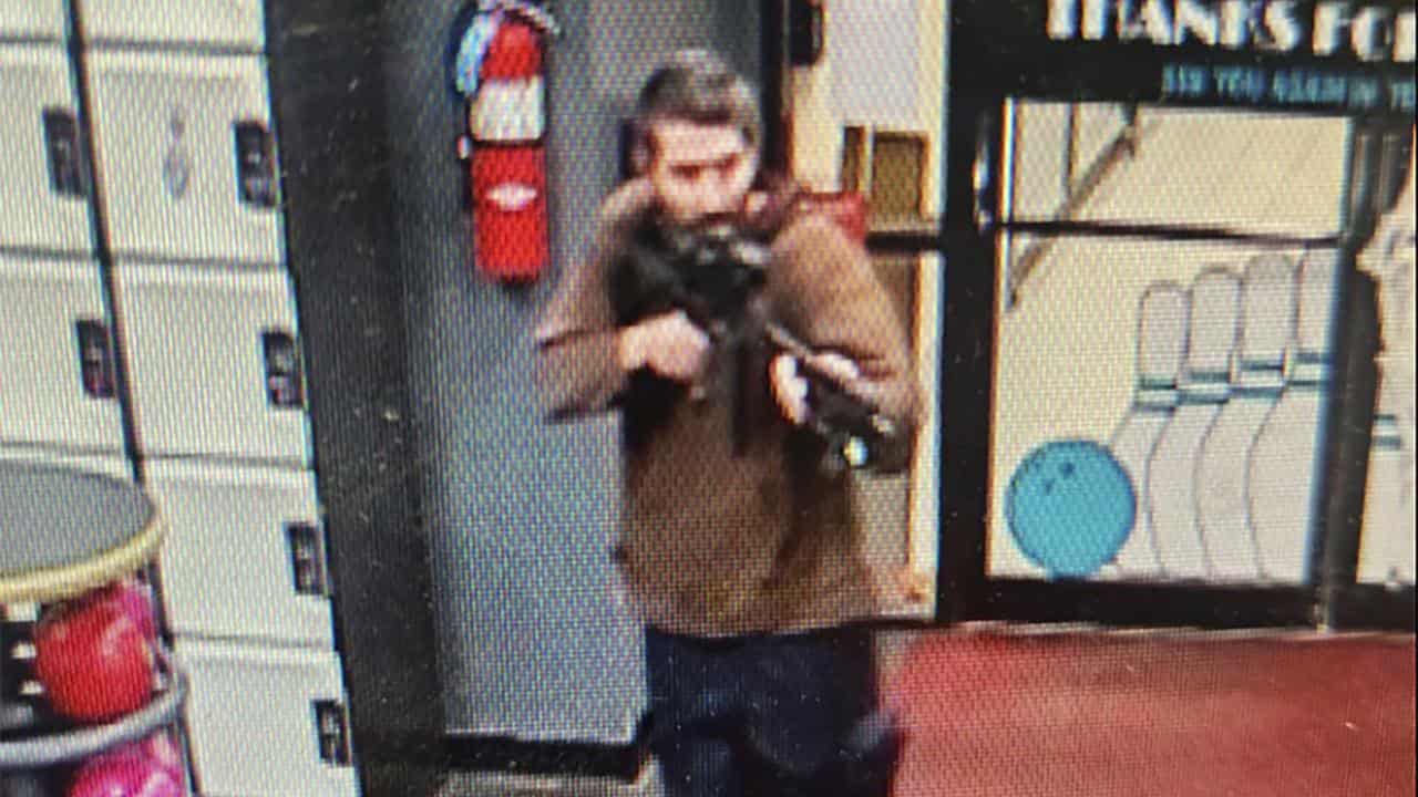 Shooting suspect with a gun