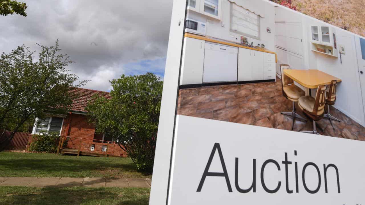 An auction sign at a Canberra property