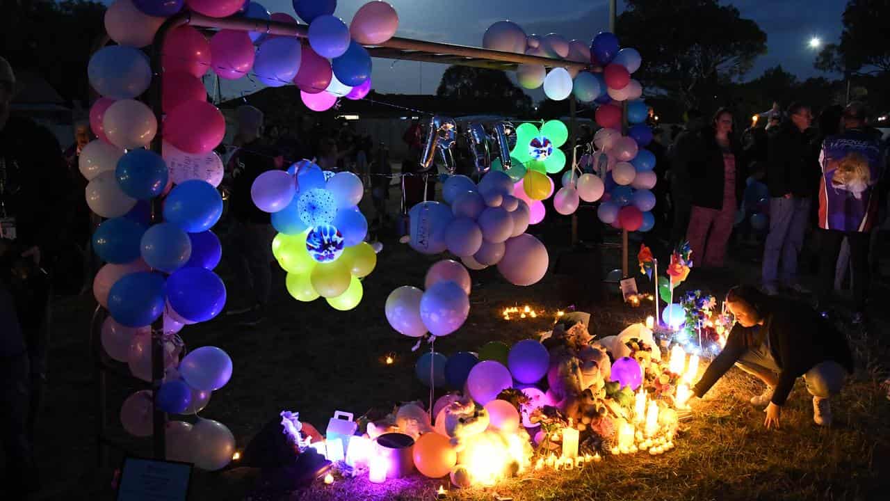 Balloons at a community vigil