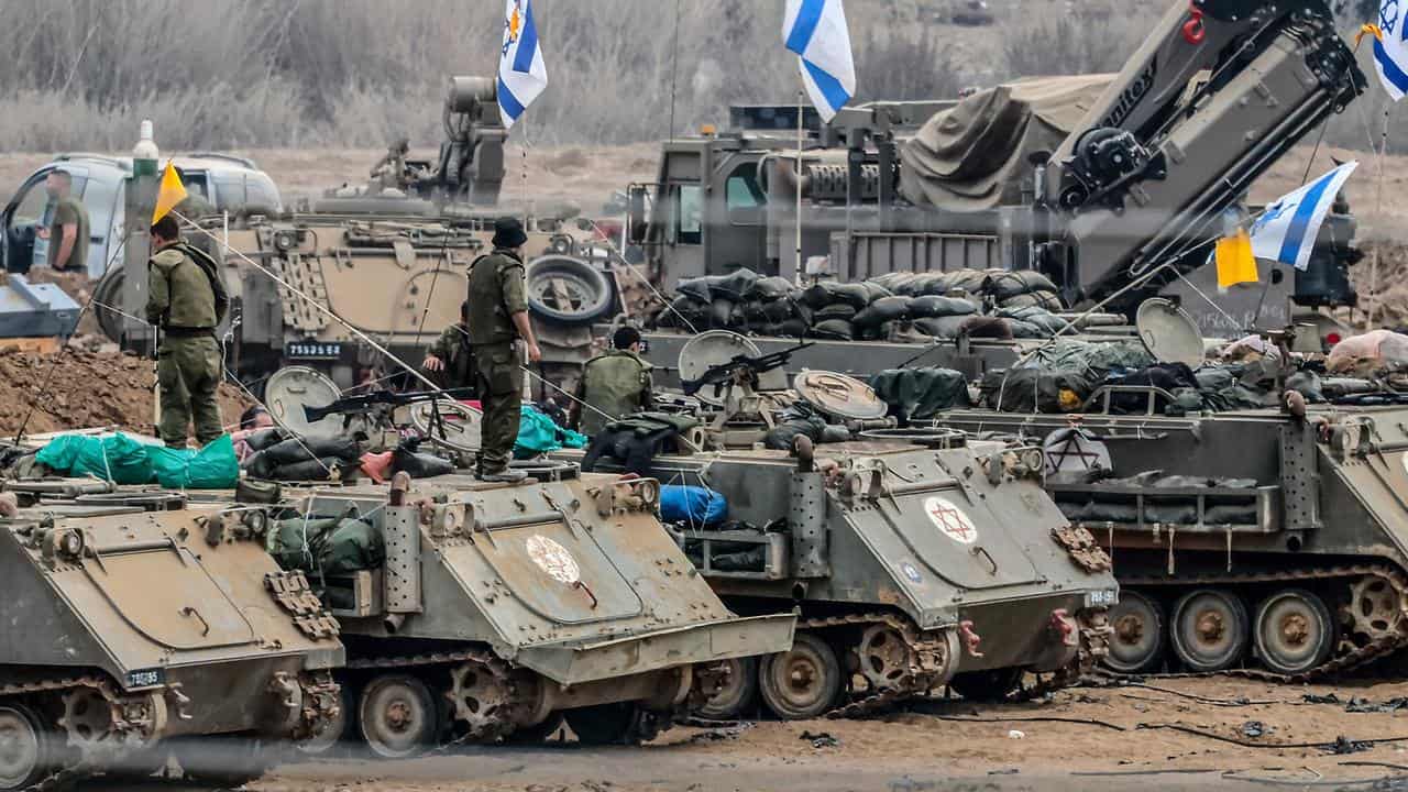 Israeli soldiers prepare ground manoeuvres near the border with Gaza