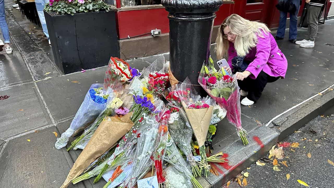 A makeshift memorial for Matthew Perry in New York.