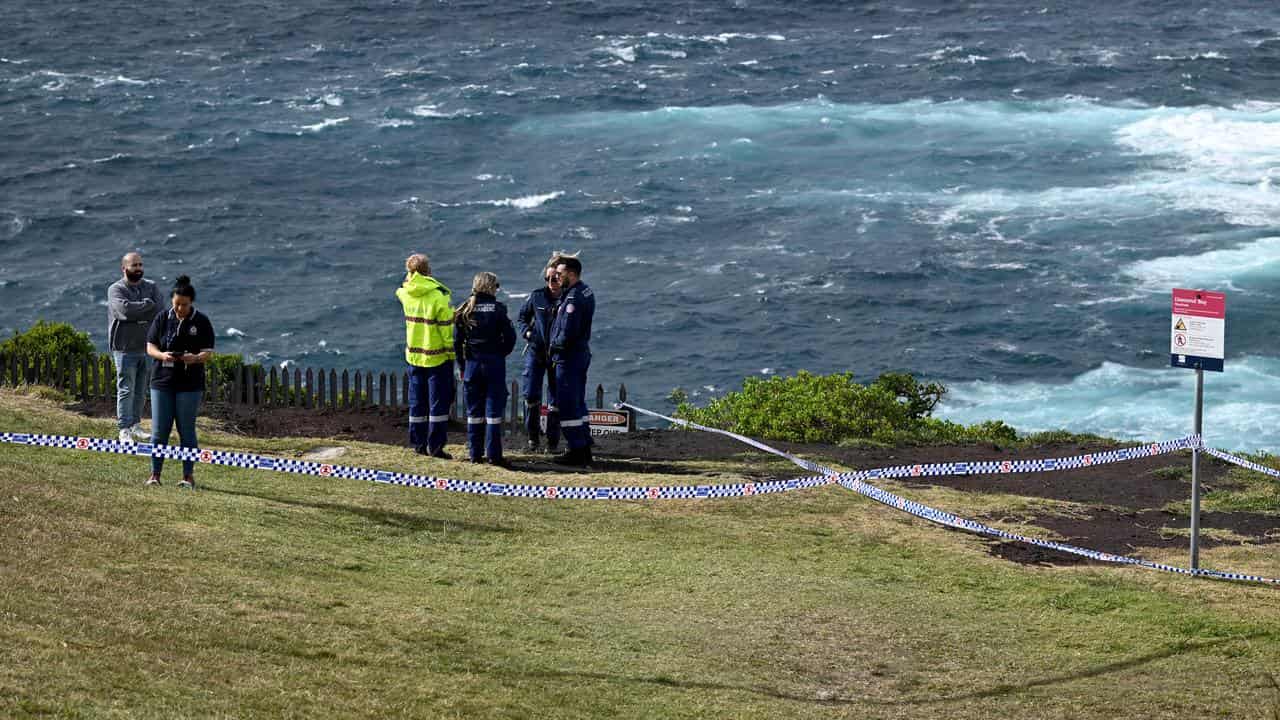 Police setting up a crime scene at the clifftop Diamond Bay Reserve.