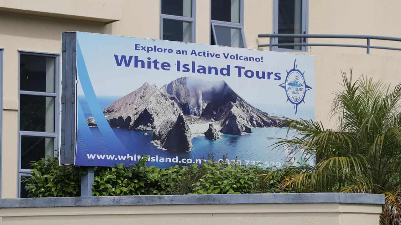 A billboard advertising White Island Tours in Whakatane, New Zealand