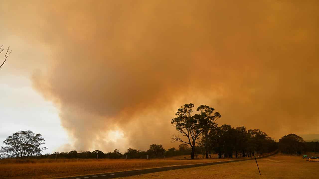 Smoke from a bushfire is seen south of Warwick,