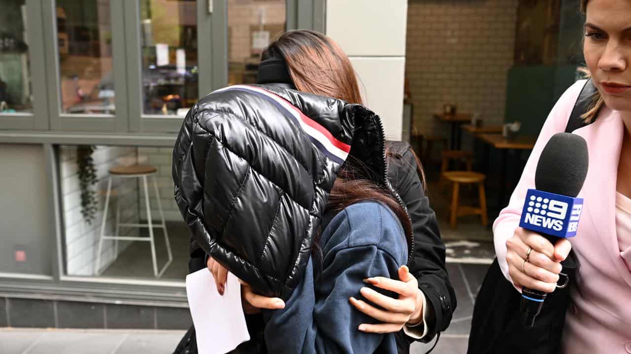 Jie Lu, wife of Zuo Chen, leaves Melbourne Magistrates Court