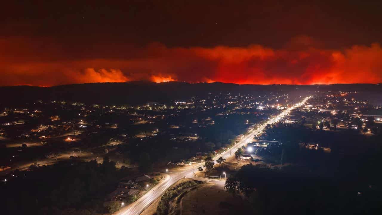 Fire is seen in the distance from the Tenterfield CBD