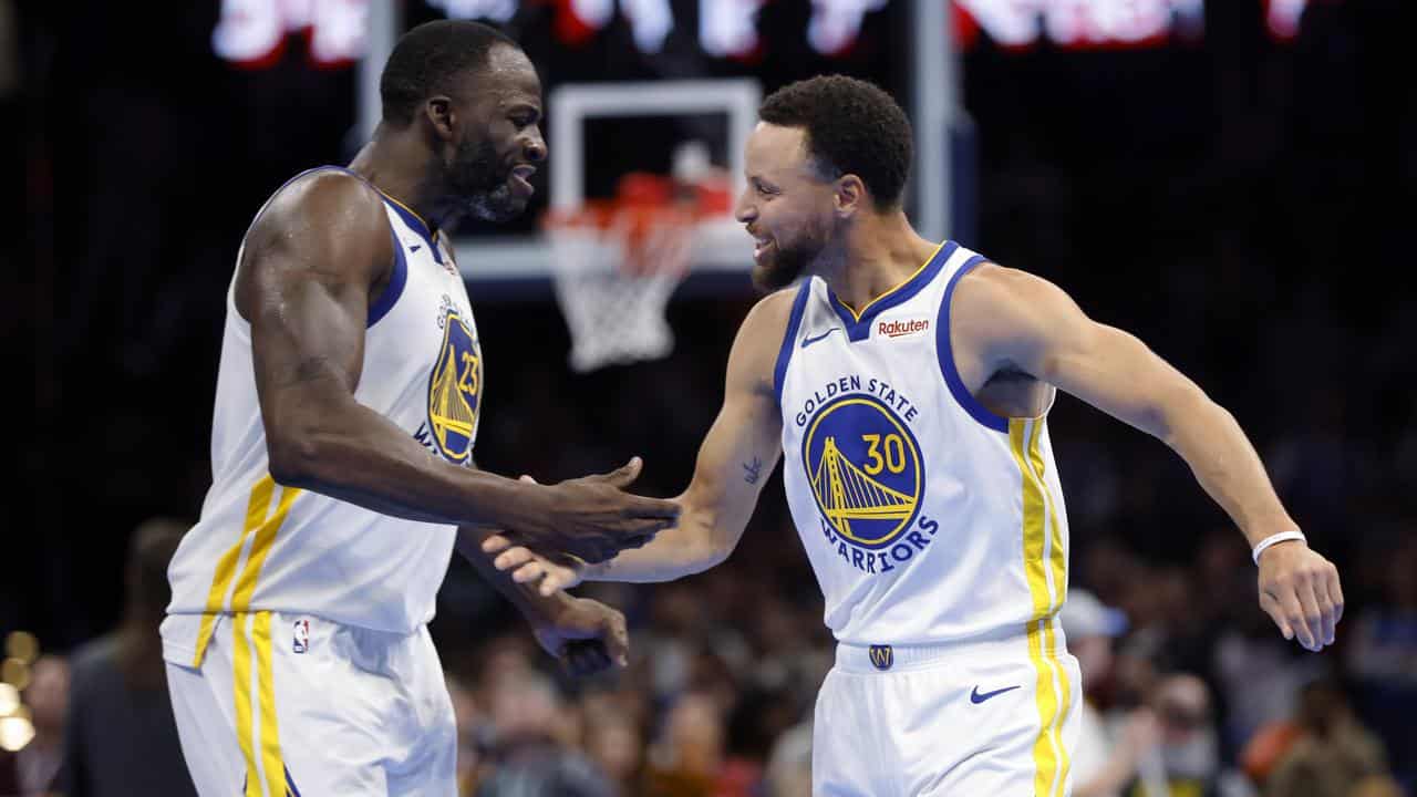 Golden State's Draymond Green (left) and Steph Curry