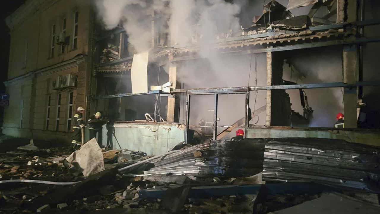 Emergency workers at the site of the Russian rocket attack in Odesa