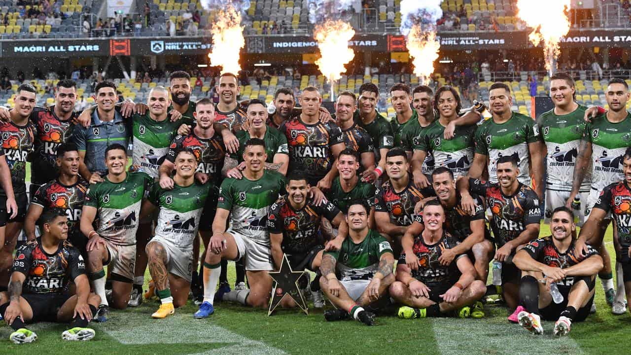 Indigenous and Maori All Stars players pose for a photo.