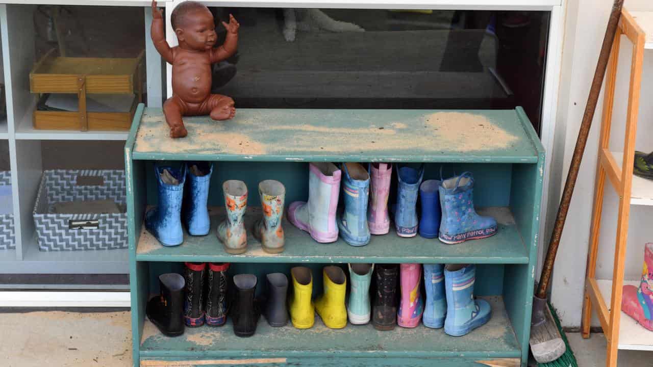 Children's rain boots at an early childhood centre.