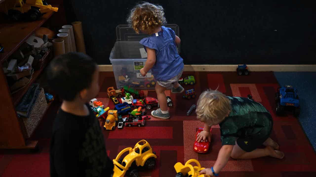 A group of children plan at a chilcare centre.