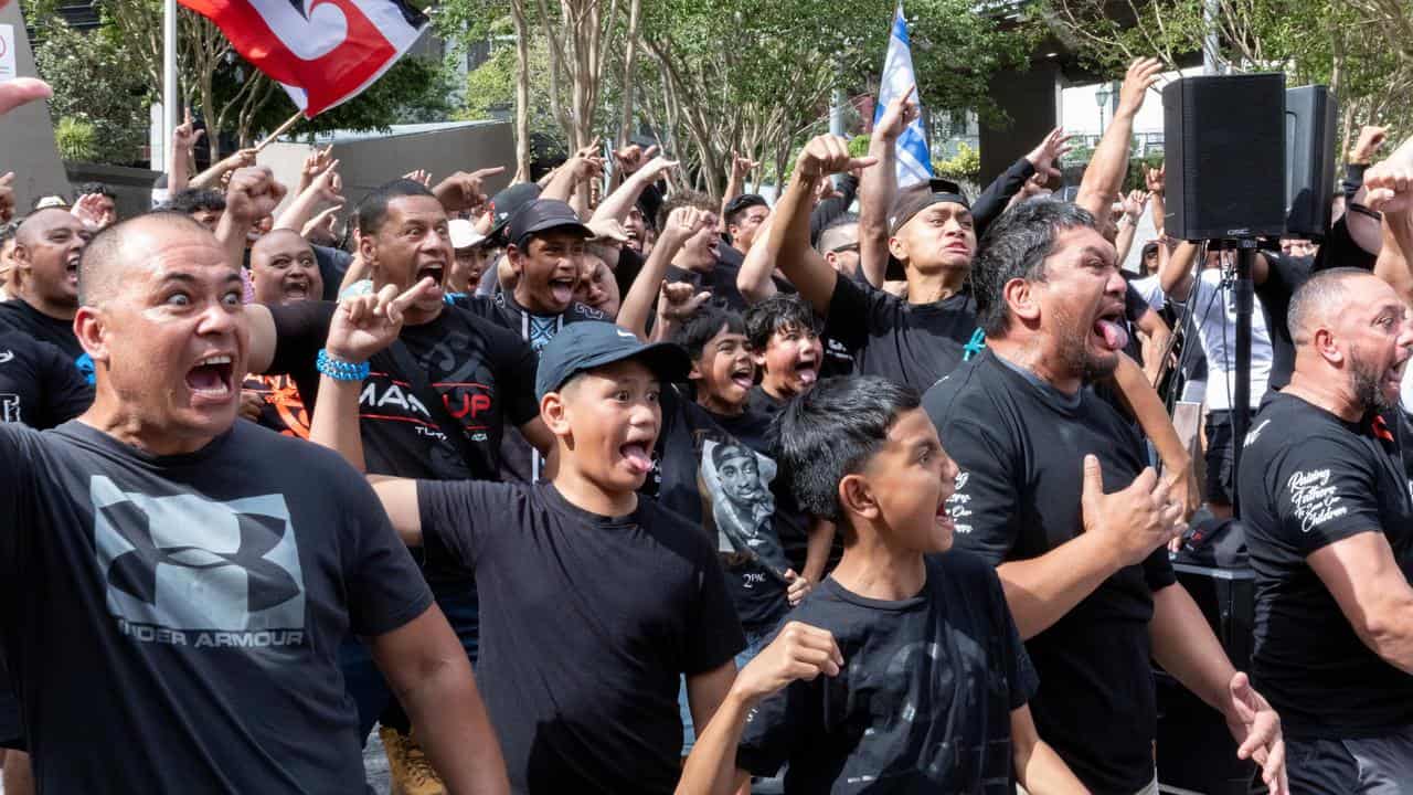 People perform a haka in Brisbane