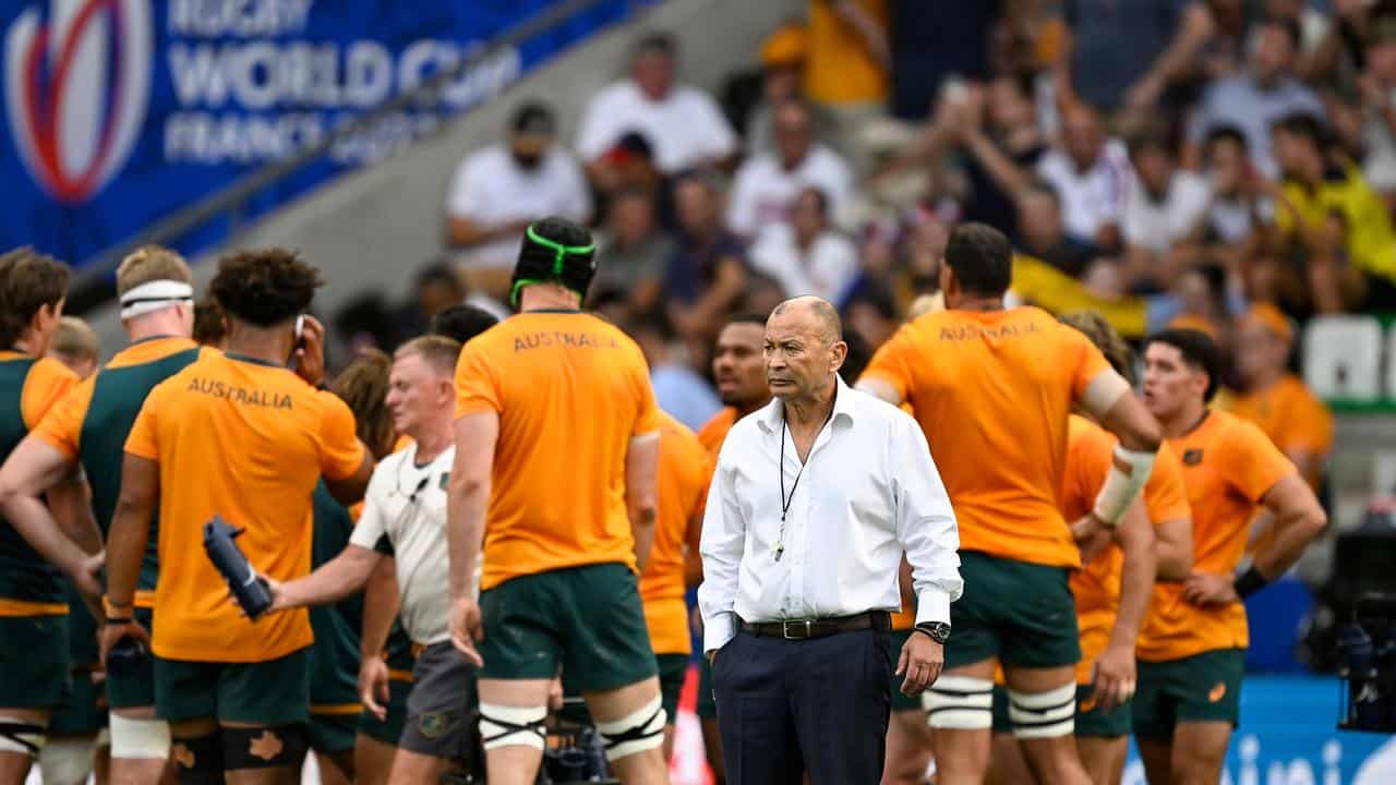 Eddie Jones walks away from the Wallabies squad at the World Cup.