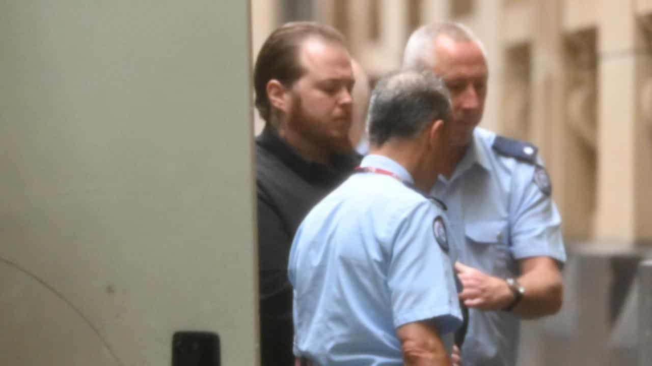 Ashley Feetham (left) arrives at the Supreme Court of Victoria