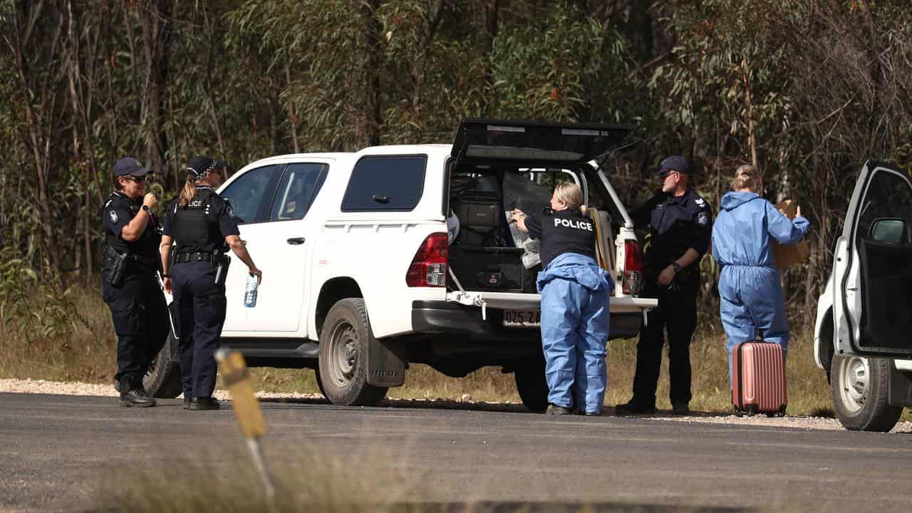 Police work near the Wieambilla shooting scene (file image)