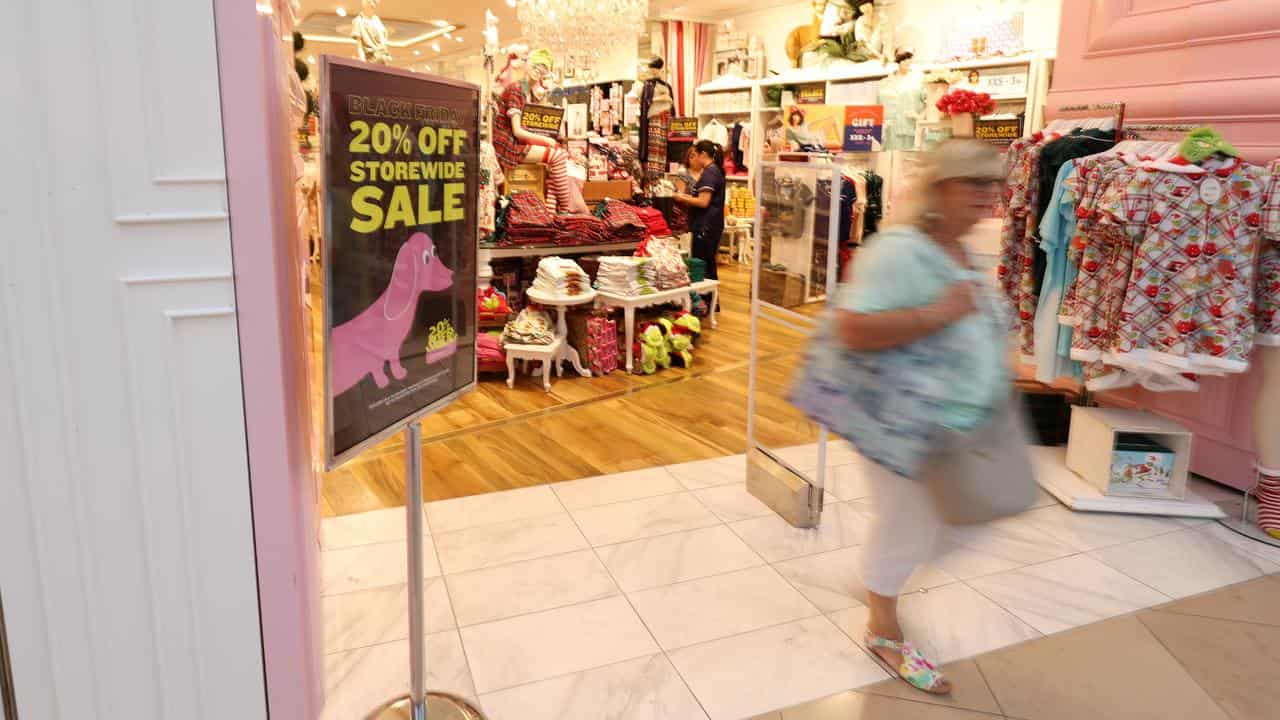 Shoppers are seen during Black Friday sales