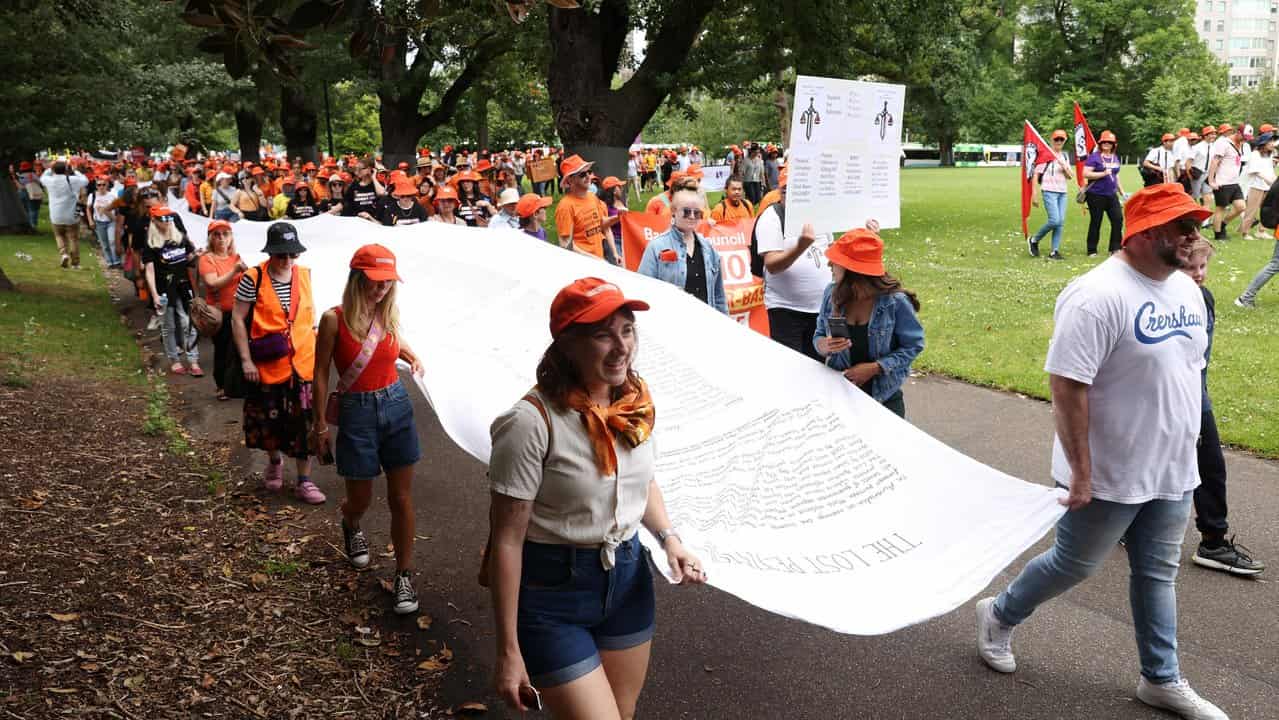 Supporters carrying the 'Lost Petition'.