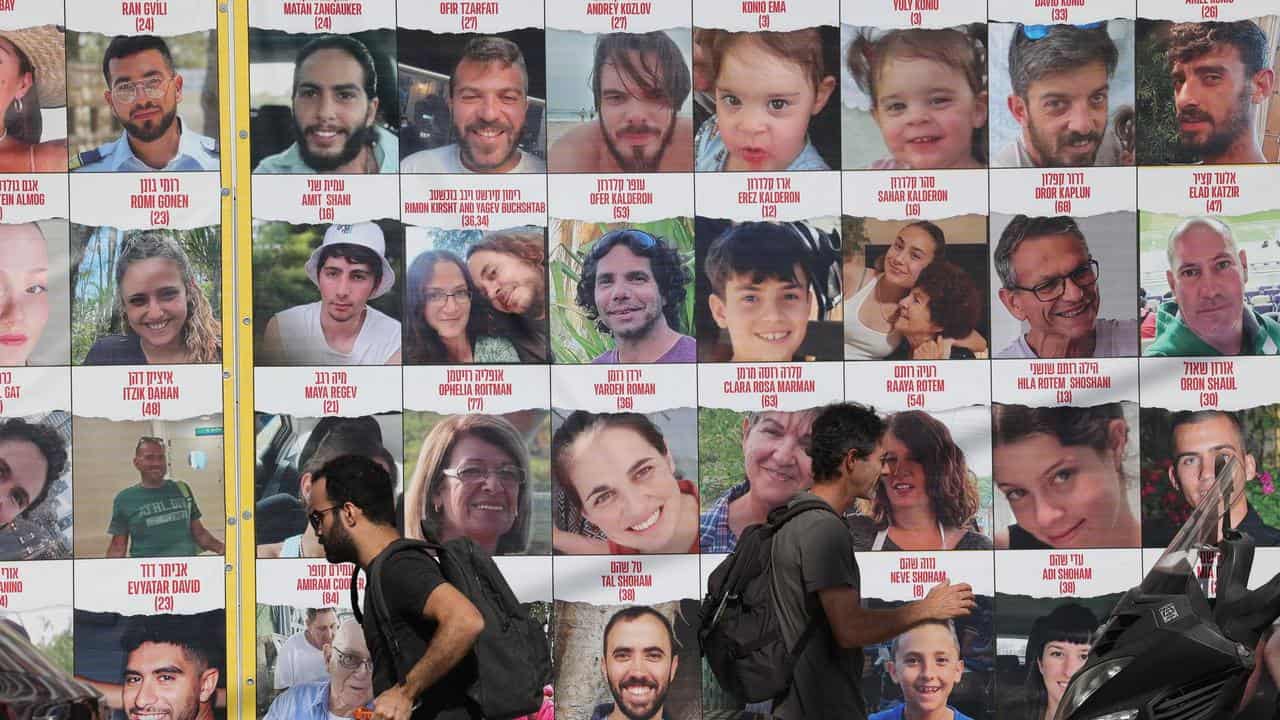 A billboard showing Israeli hostages being held by Hamas in Gaza