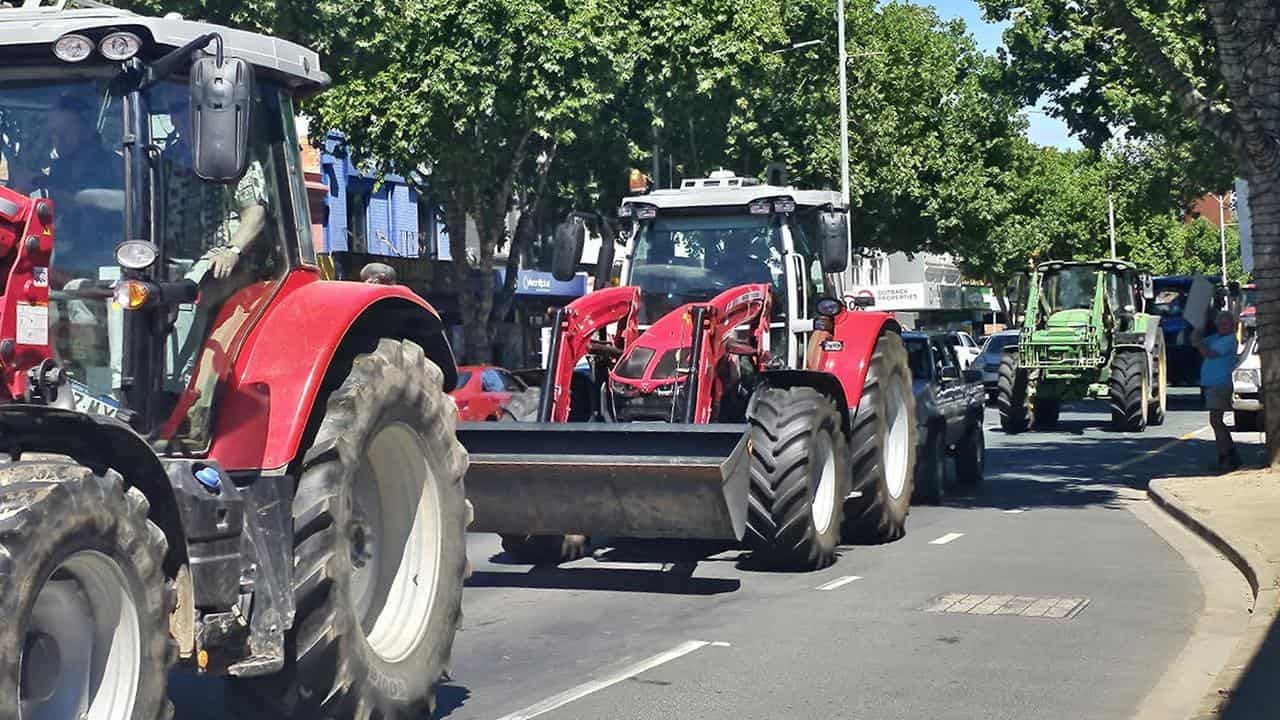 Farmers drive tractors during Shepparton rally