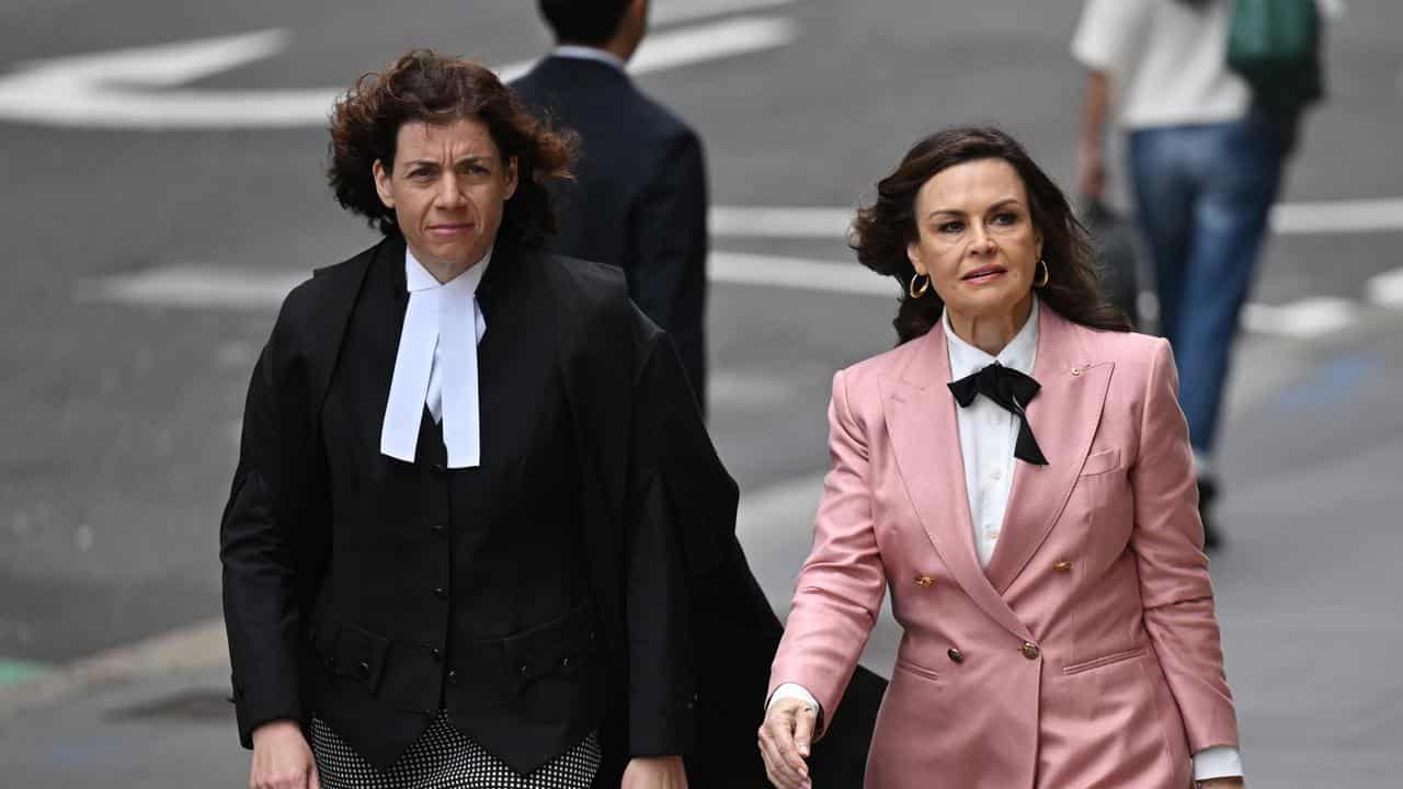 Sue Chrysanthou SC and Lisa Wilkinson outside Federal Court in Sydney.