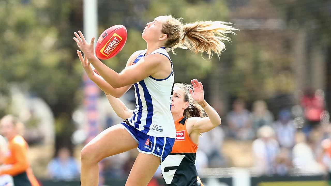 North Melbourne's Lulu Pullar (left) in action v GWS.